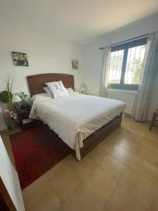 Postel nebo postele na pokoji v ubytování VILLA ALCAZAR + 15 fotografií