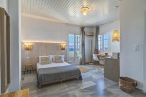 Postel nebo postele na pokoji v ubytování Thalassa Naxos