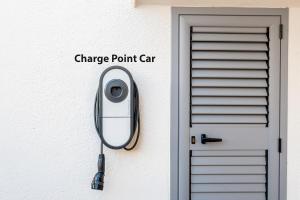 a stethoscope hanging on a wall next to a door at Villa di Punta, Leuca - by HDSalento in Leuca