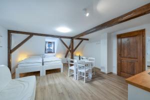 Postel nebo postele na pokoji v ubytování Avama - apartmány Srní