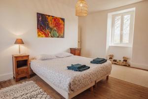 En eller flere senge i et værelse på Rouède - Maison de caractère au pied des Pyrénées