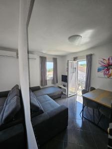 Postel nebo postele na pokoji v ubytování Apartments Andrijanić