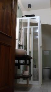 a bathroom with a sink and a bath tub at Rosari Spada Suite sec XVI in Spoleto +40 photos