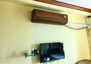 TV a/nebo společenská místnost v ubytování New Islamabad Hotel