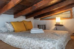 a bedroom with a large bed in a room at Arico Cave Experience in Arico +37 photos