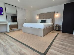 Postel nebo postele na pokoji v ubytování Hotel CG London