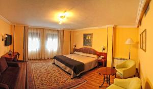 Postel nebo postele na pokoji v ubytování Hotel Alisi