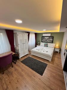 Postel nebo postele na pokoji v ubytování GV Suites Galata