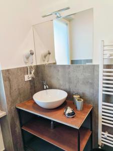 a bathroom with a sink and a mirror at Villa Petra - Πέτρα in Alpignano +38 photos