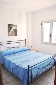 Кровать или кровати в номере CasaPescoluse