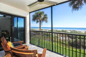 a balcony with a view of the beach at Stylish 2BR Sanibel Condo With Amazing Beach Views 5C2 in Sanibel