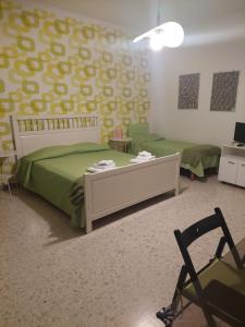 Postel nebo postele na pokoji v ubytování B&B Dietro l'Angolo