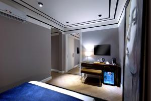 TV a/nebo společenská místnost v ubytování Walton Hotels Galata