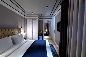 Postel nebo postele na pokoji v ubytování Walton Hotels Galata