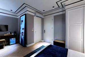 TV a/nebo společenská místnost v ubytování Walton Hotels Galata