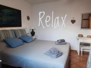 A bed or beds in a room at Tramuntana 37, 1°
