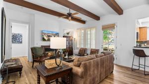 a living room with a couch and a ceiling fan at LV315 3BR LV Townhome with Mountain Views in La Quinta