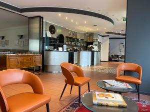 Posezení v ubytování Hotel Ristorante SASSO