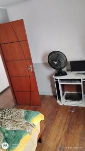 Un televizor și/sau centru de divertisment la Santa Alexandrina