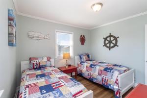 Postel nebo postele na pokoji v ubytování Maymo's Nook