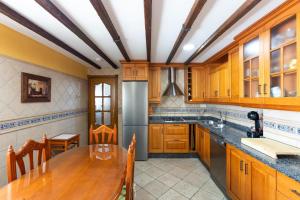 Kuchyň nebo kuchyňský kout v ubytování Los Pinos Mar y Montaña