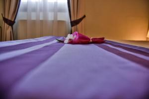 Postel nebo postele na pokoji v ubytování Hotel Bella Firenze