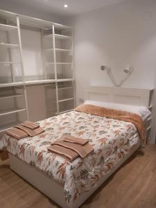 Giường trong phòng chung tại Valencia Aparthotel HBB