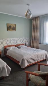 Postel nebo postele na pokoji v ubytování Ustronie + 7 fotografií