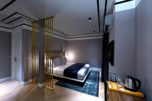 Postel nebo postele na pokoji v ubytování Walton Hotels Galata
