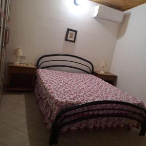 Кровать или кровати в номере Casa Solanas N. 2