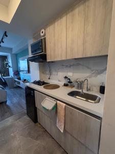 Η κουζίνα ή μικρή κουζίνα στο Loft Comfy Bogotá