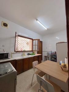 Kuchyň nebo kuchyňský kout v ubytování Apartment in Monastir