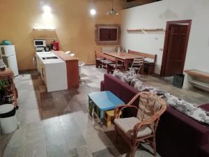 a living room with a couch and a table at Casa Villarmayor in Villarmayor