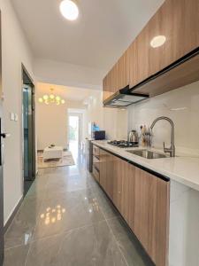 a kitchen with a sink and a counter top at Iconic 1Br in Riverside with views and gym in Nairobi