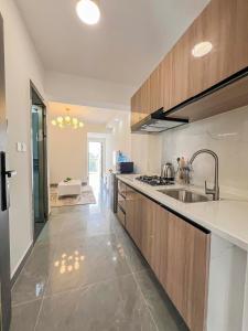 a kitchen with a sink and a counter top at Iconic 1Br in Riverside with views and gym in Nairobi