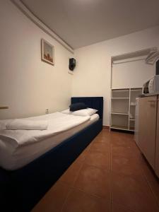 Postel nebo postele na pokoji v ubytování P4D room
