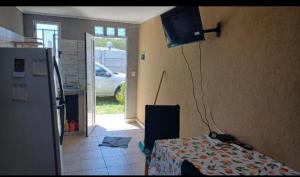 Una televisión o centro de entretenimiento en Nova Camet