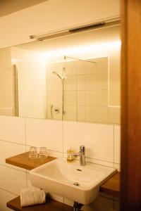 Koupelna v ubytování Tanafreida Berg-Refugium + 37 fotografií