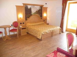 Posteľ alebo postele v izbe v ubytovaní Hotel Almazzago