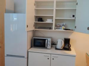Kuchyň nebo kuchyňský kout v ubytování Hotel 24 - Karihaara - Kemi