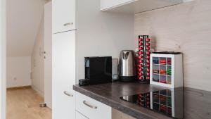 Kuchnia lub aneks kuchenny w obiekcie Moderne Ferienwohnung mit Bergblick