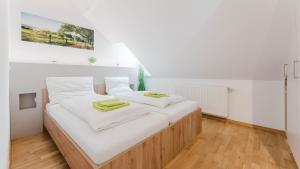 Łóżko lub łóżka w pokoju w obiekcie Moderne Ferienwohnung mit Bergblick