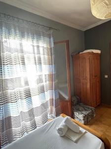 Postel nebo postele na pokoji v ubytování EVA APARTMENT
