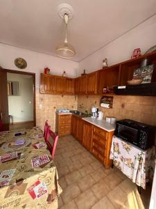Kuchyň nebo kuchyňský kout v ubytování EVA APARTMENT