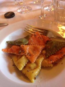 a plate of food with a fork on a table at Agriturismo Il Casalone in Badia Tedalda