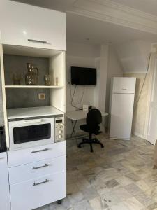 Kuchyň nebo kuchyňský kout v ubytování Appartement s1 vue mer à la marsa