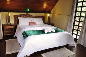 Cama ou camas em um quarto em Castelar da Alvorada