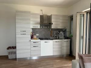 A kitchen or kitchenette at Casa Sole Mare