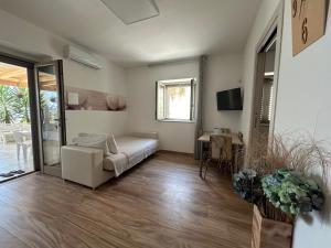 A television and/or entertainment centre at Casa Sole Mare