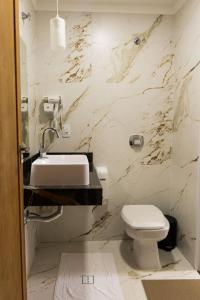 Koupelna v ubytování Hotel Uipi
